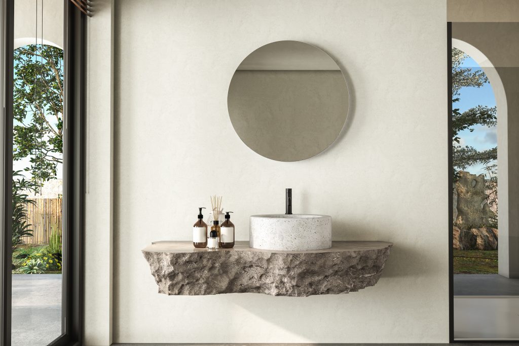 Minimalistic bathroom featuring a natural stone countertop with