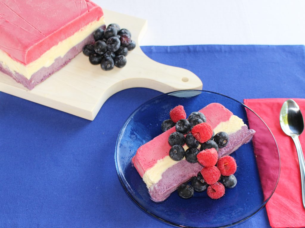 Slice of Red, White, and Blue Semifreddo with Berries